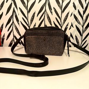 Madewell transport camera bag in black leather and spotted calf